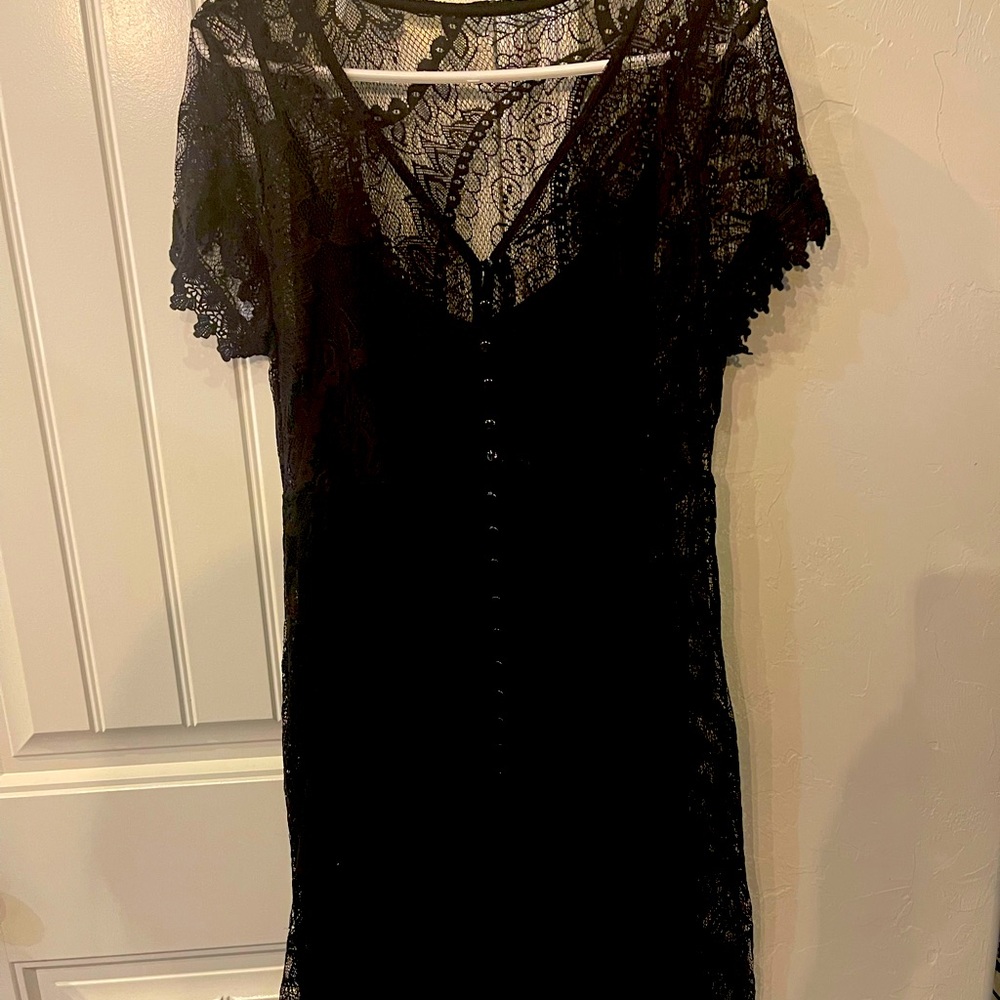 Black, short lace torrid dress with tank dress underneath. Size 1x